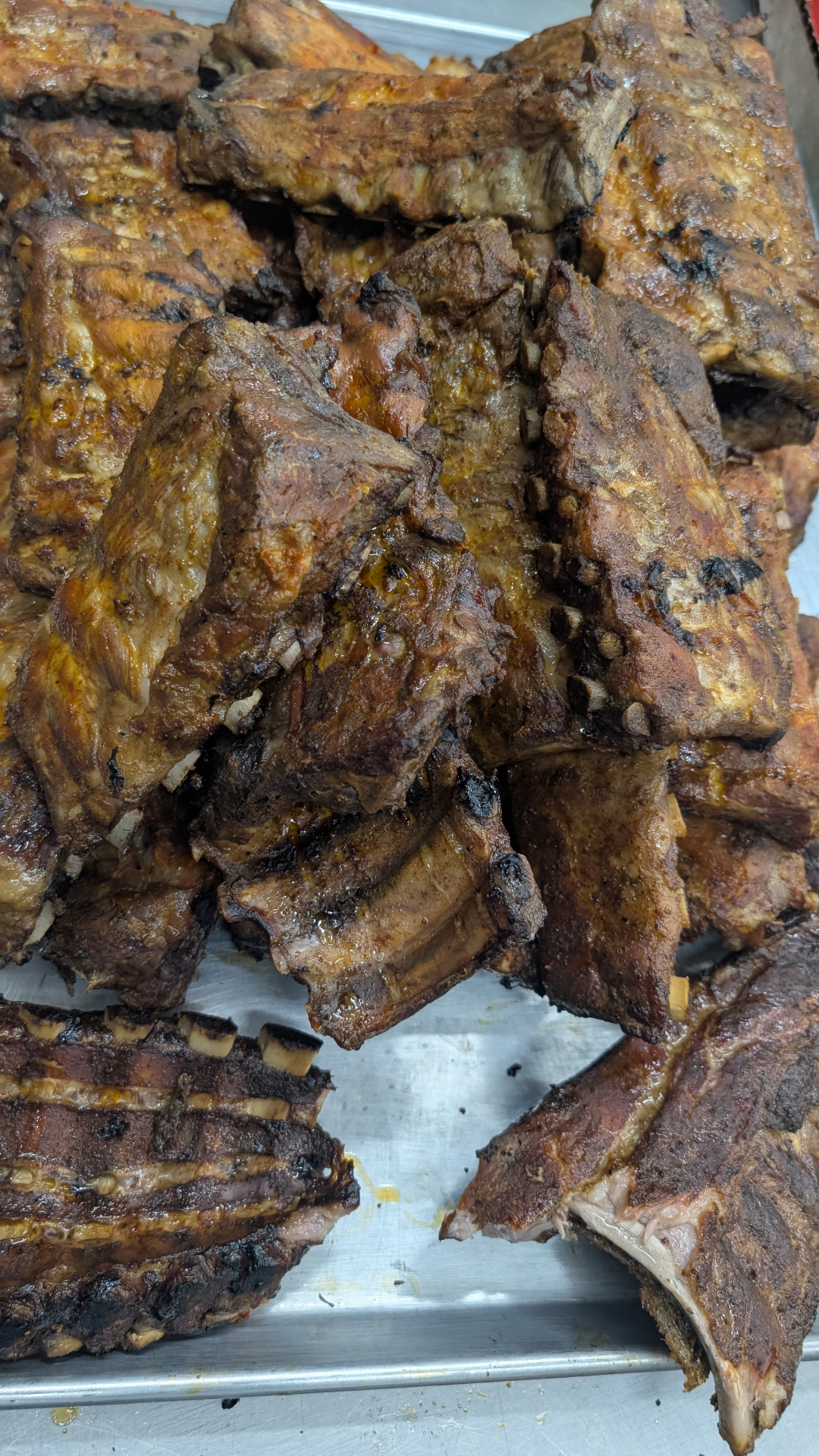Hand-smoked ribs tray fresh out of the smoker at the SmashMeals Kingsport kitchen