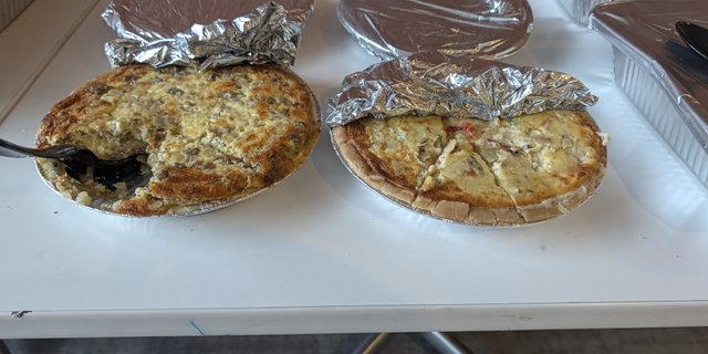 Two SmashMeals quiches in foil pans, as shown for Sausage & Mozzarella Quiche on ezCater
