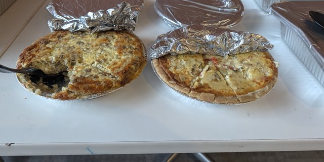 Two SmashMeals quiches in foil pans, as shown for Veggie Quiche on ezCater