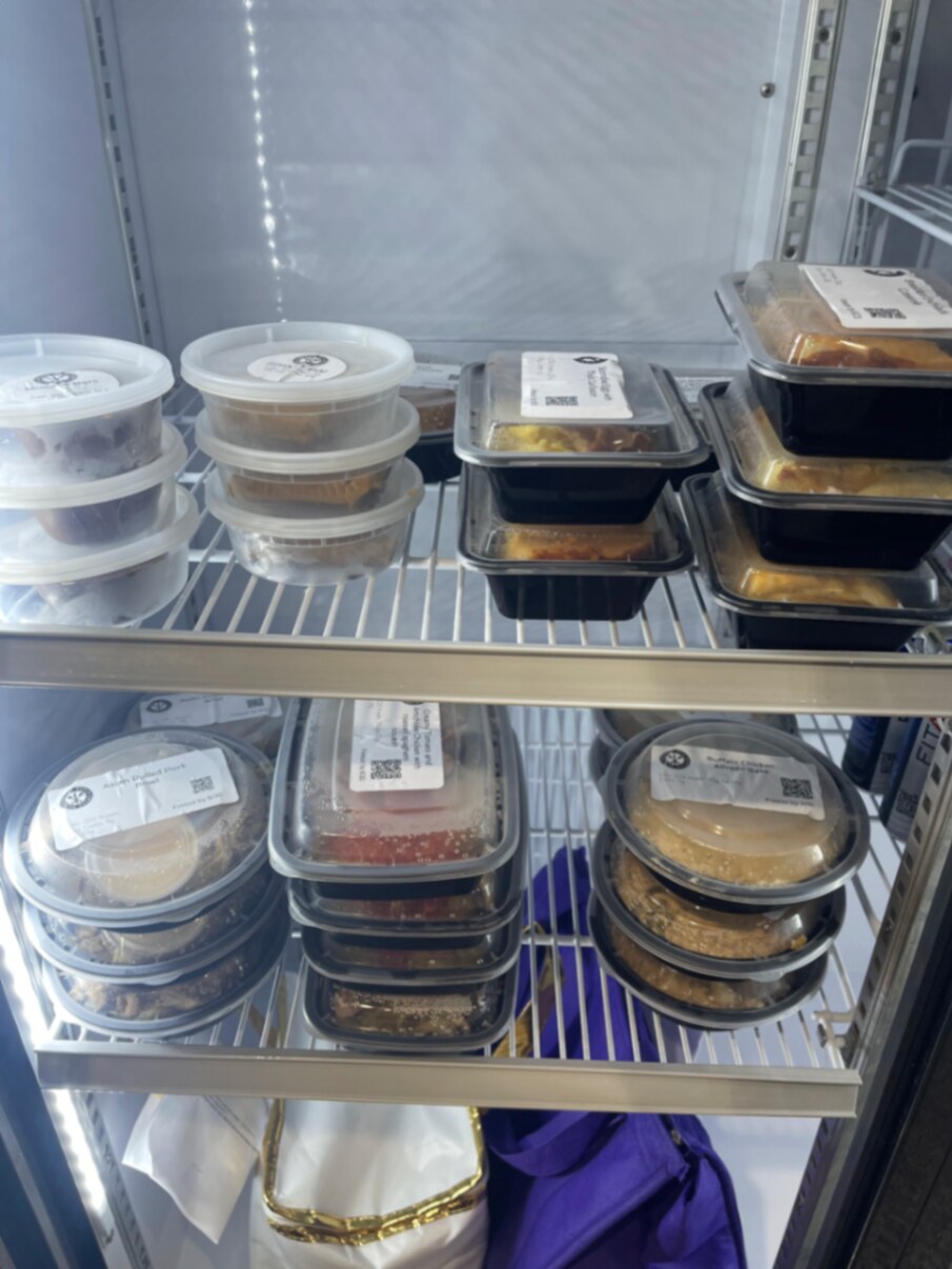 Packaged SmashMeals meals stored on refrigerator shelves
